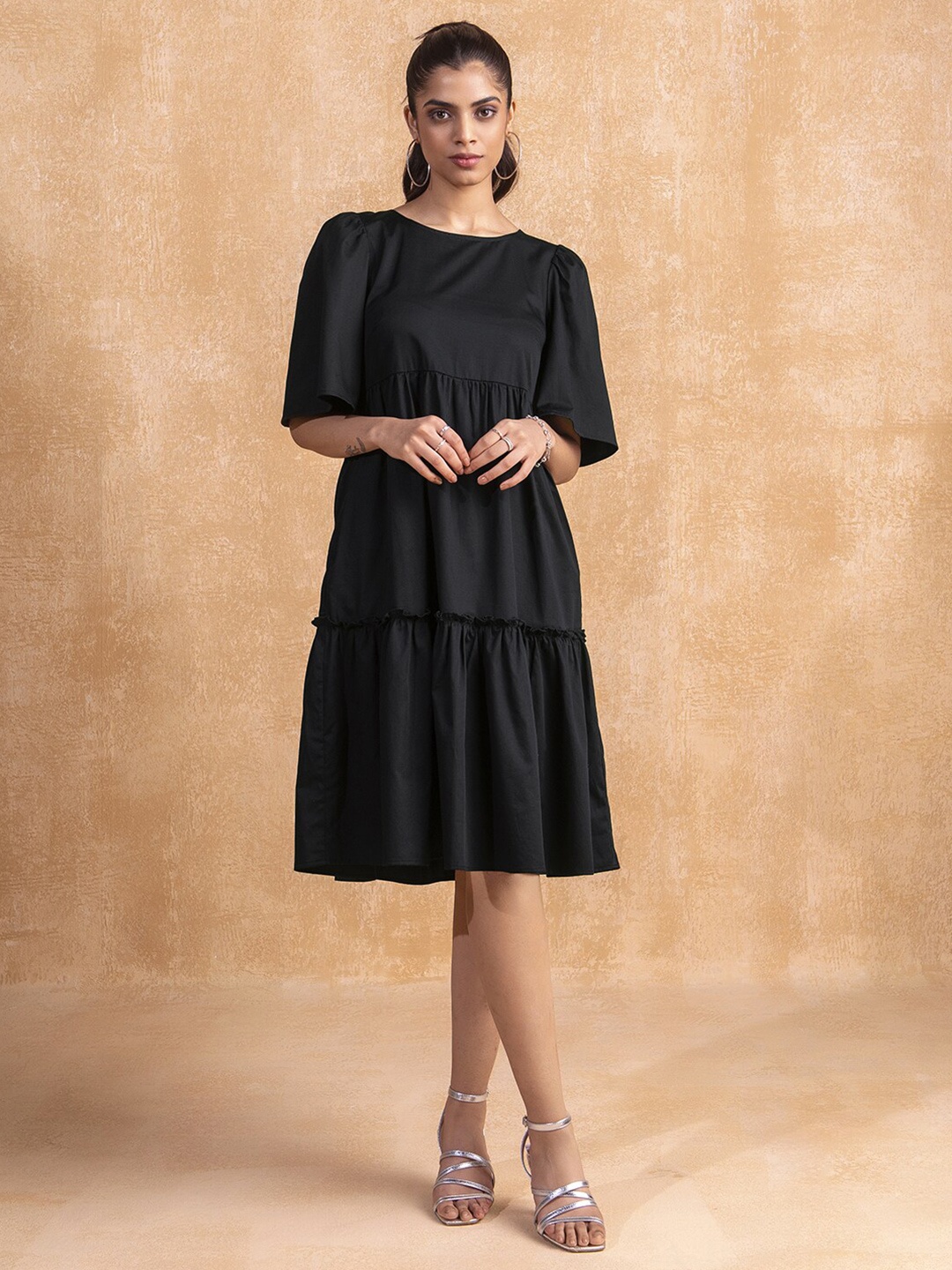 

Femella Black Cotton Round Neck Tiered A-Line Dress