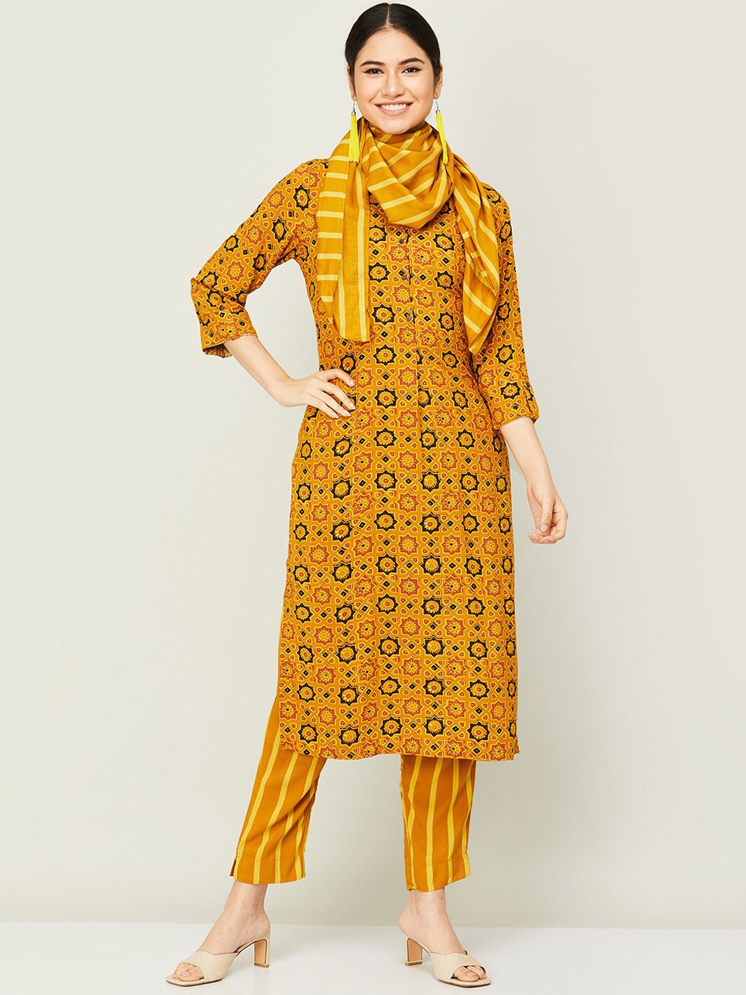 

Melange by Lifestyle Women Yellow Floral Printed Kurta with Trousers & With Dupatta