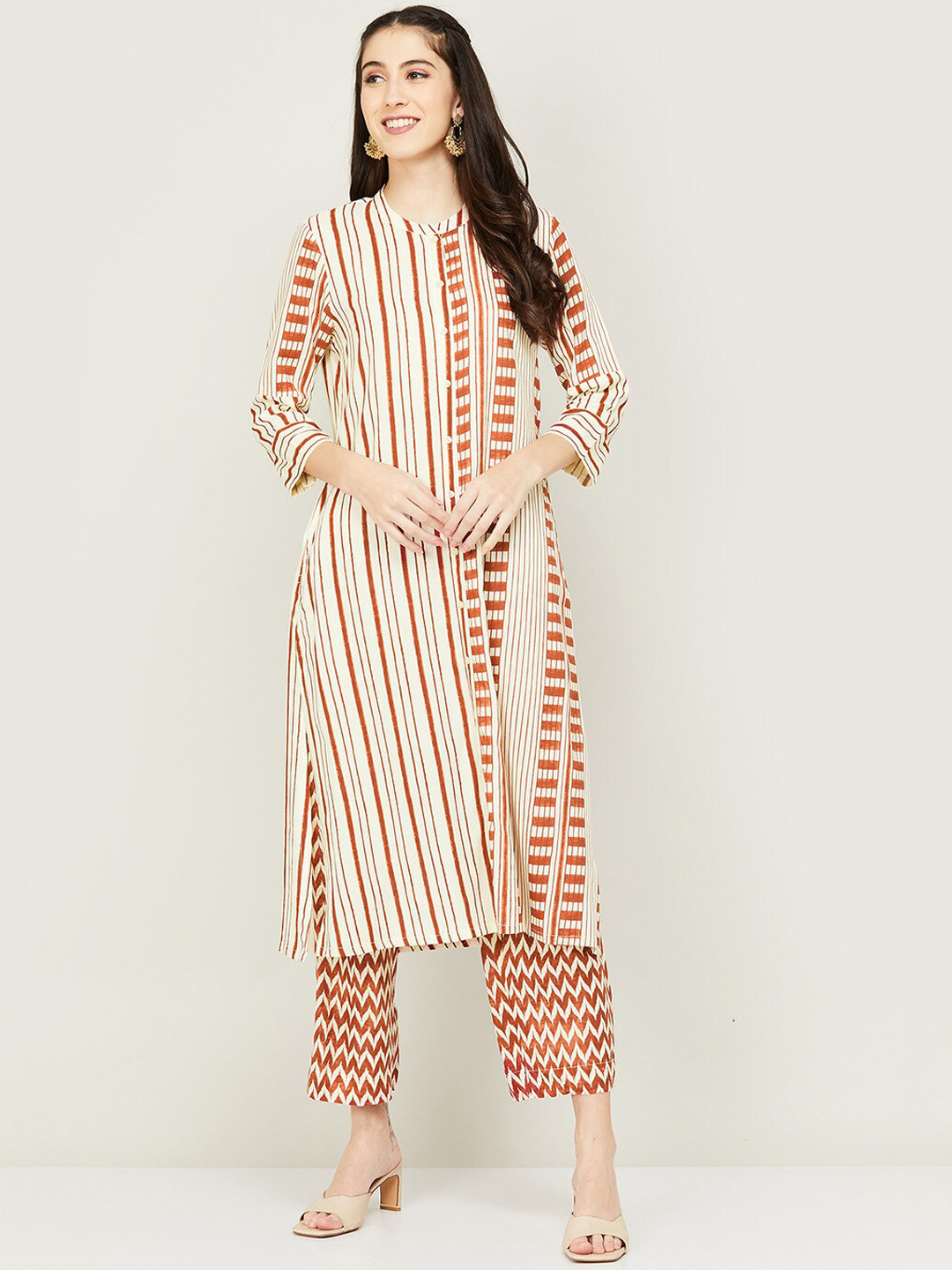 

Melange by Lifestyle Women Brown Viscose Printed Kurta with Pyjama Set