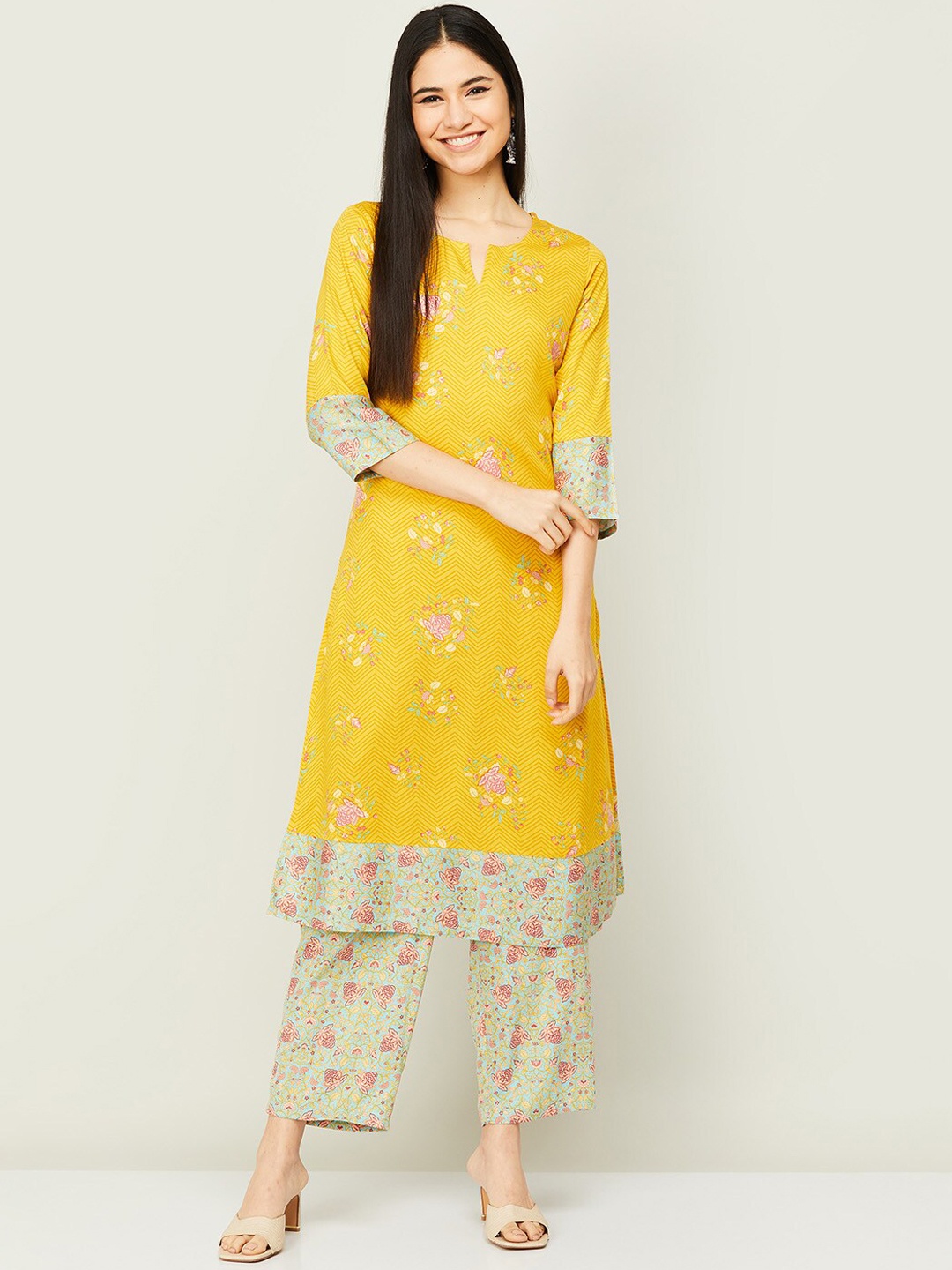 

Melange by Lifestyle Women Yellow Floral Printed Kurta with Palazzos