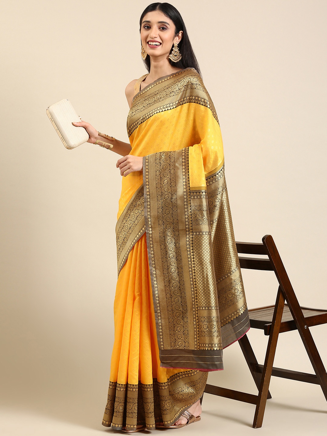 

Anouk Yellow Woven Design Silk Blend Banarasi Saree