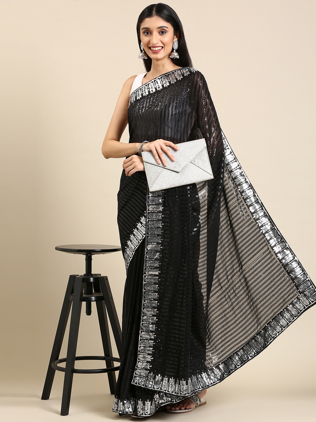 

Anouk Black Striped Embroidered Sequinned Pure Georgette Saree