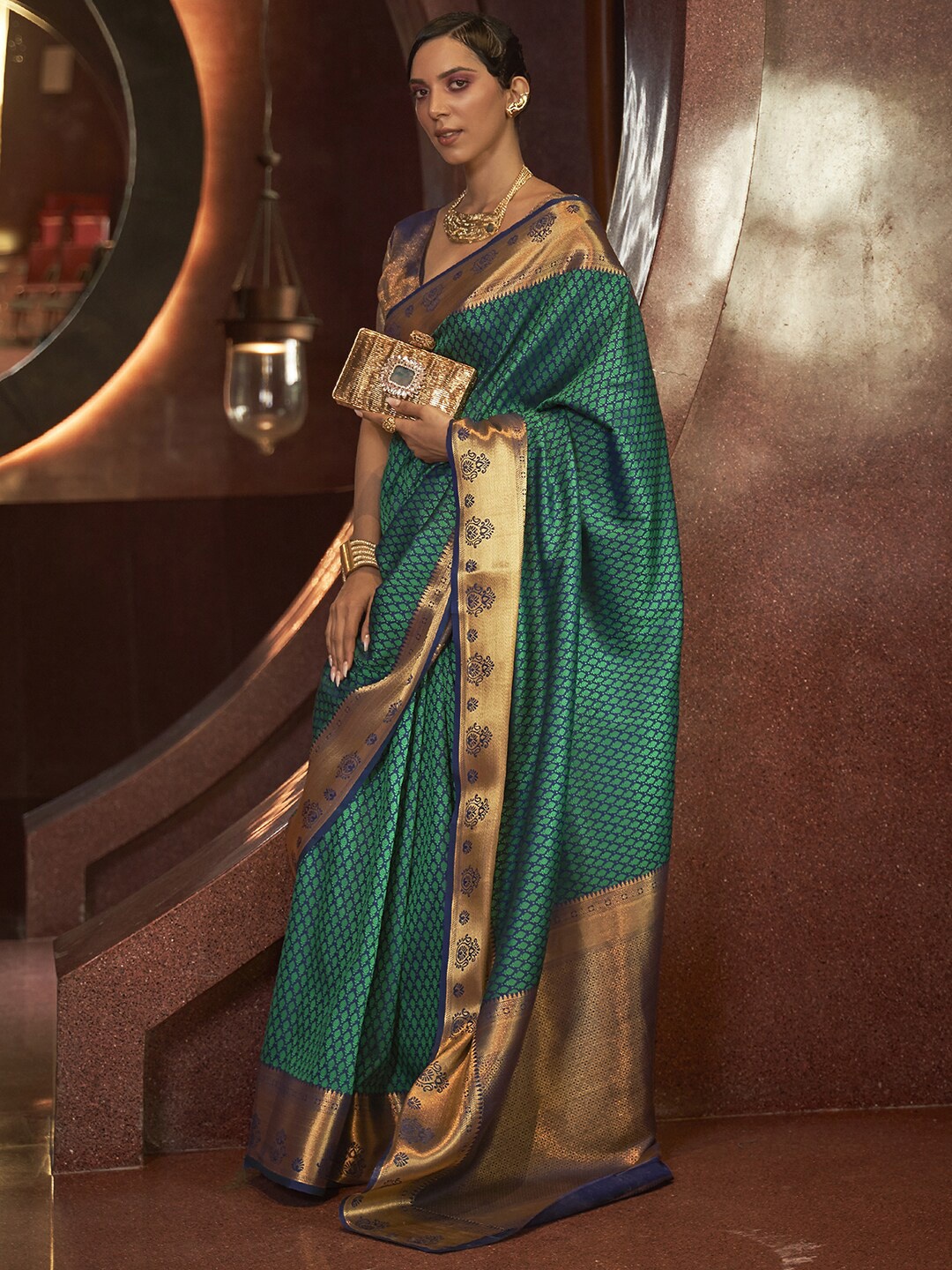 

Mitera Green & Gold-Toned Ethnic Motifs Zari Silk Blend Kanjeevaram Saree