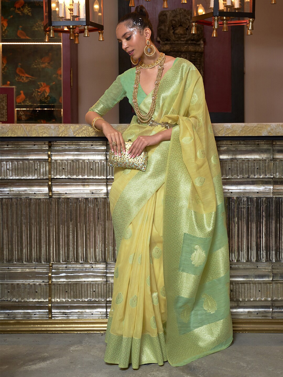 

Mitera Yellow & Green Ethnic Motifs Zari Poly Linen Bagru Saree