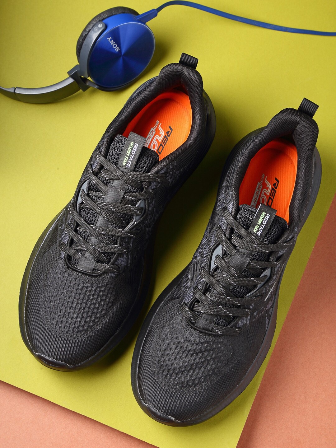 

Red Tape Men Black Walking Sports Shoes