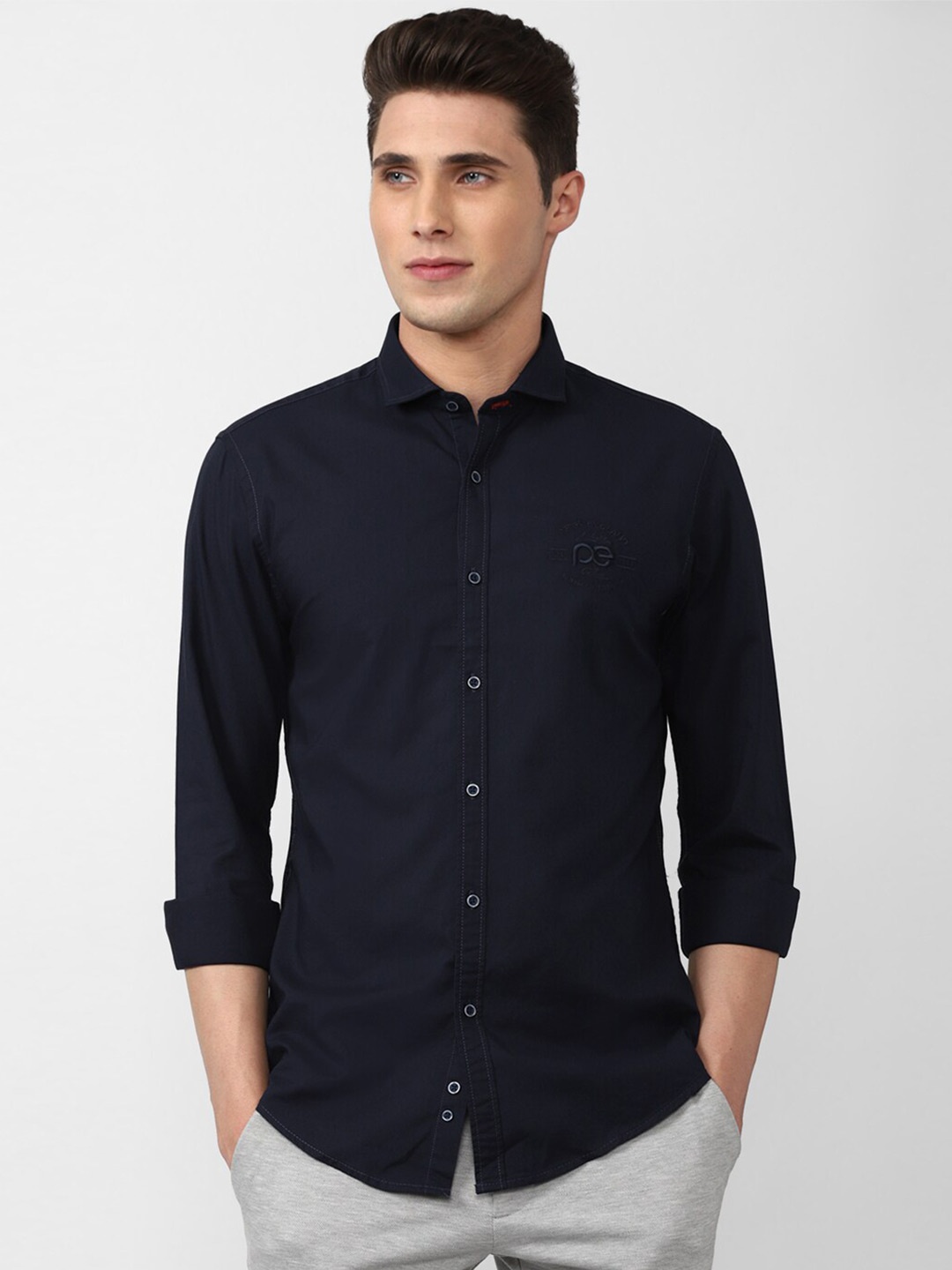 

Peter England Casuals Men Navy Blue Solid Cotton Slim Fit Casual Shirt