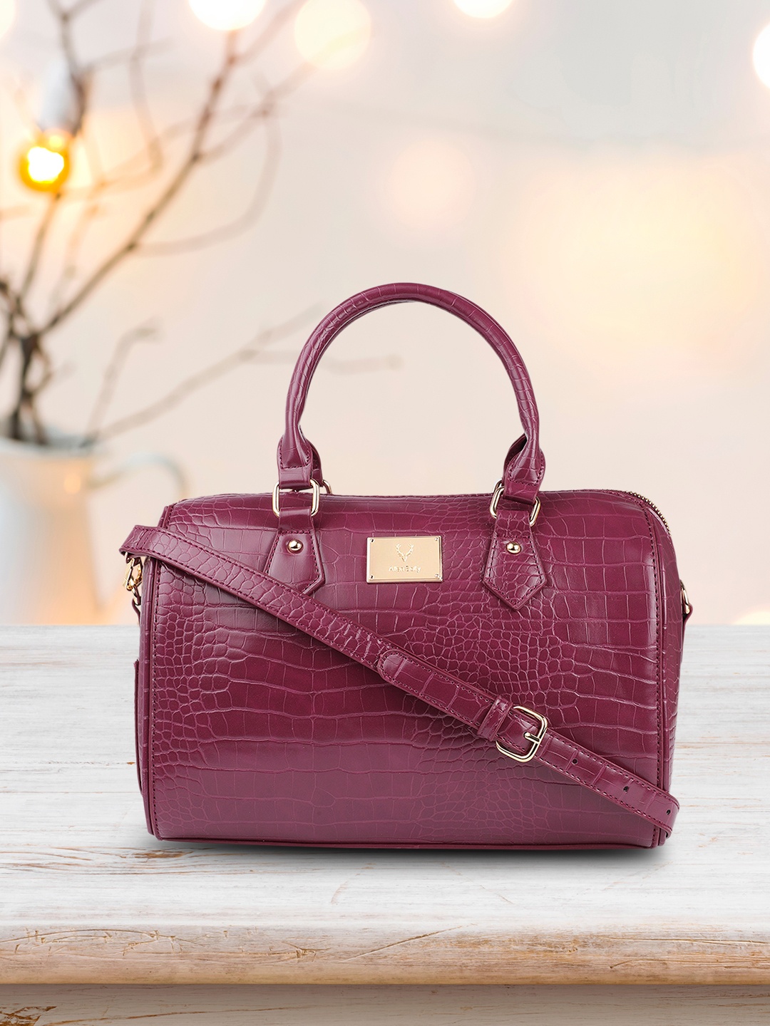 

Allen Solly Burgundy Croc Textured Bowling Handheld Bag