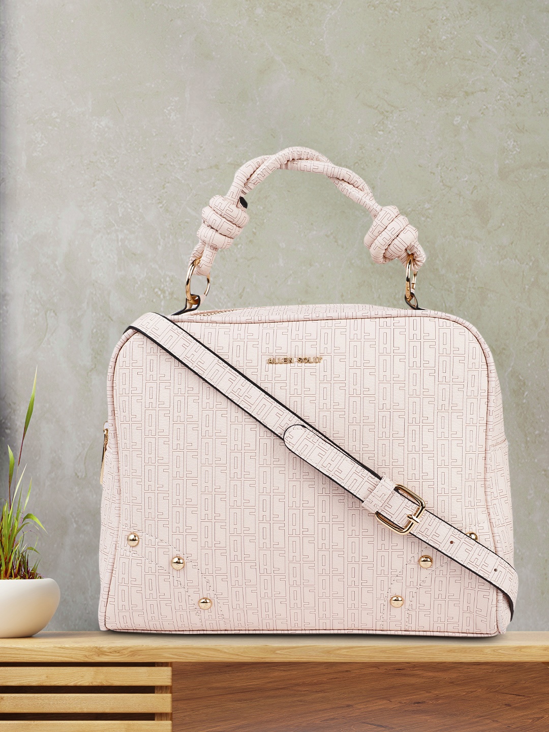 

Allen Solly Light Beige Printed Handheld Bag