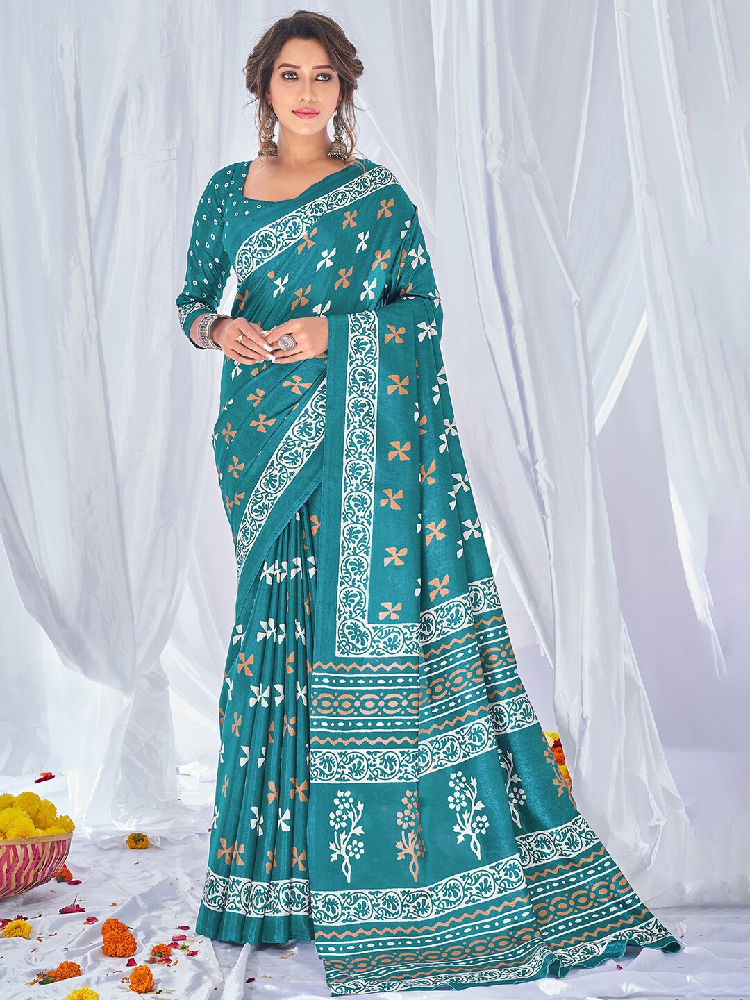 

Mitera Teal & White Bagh Silk Blend Bagru Saree