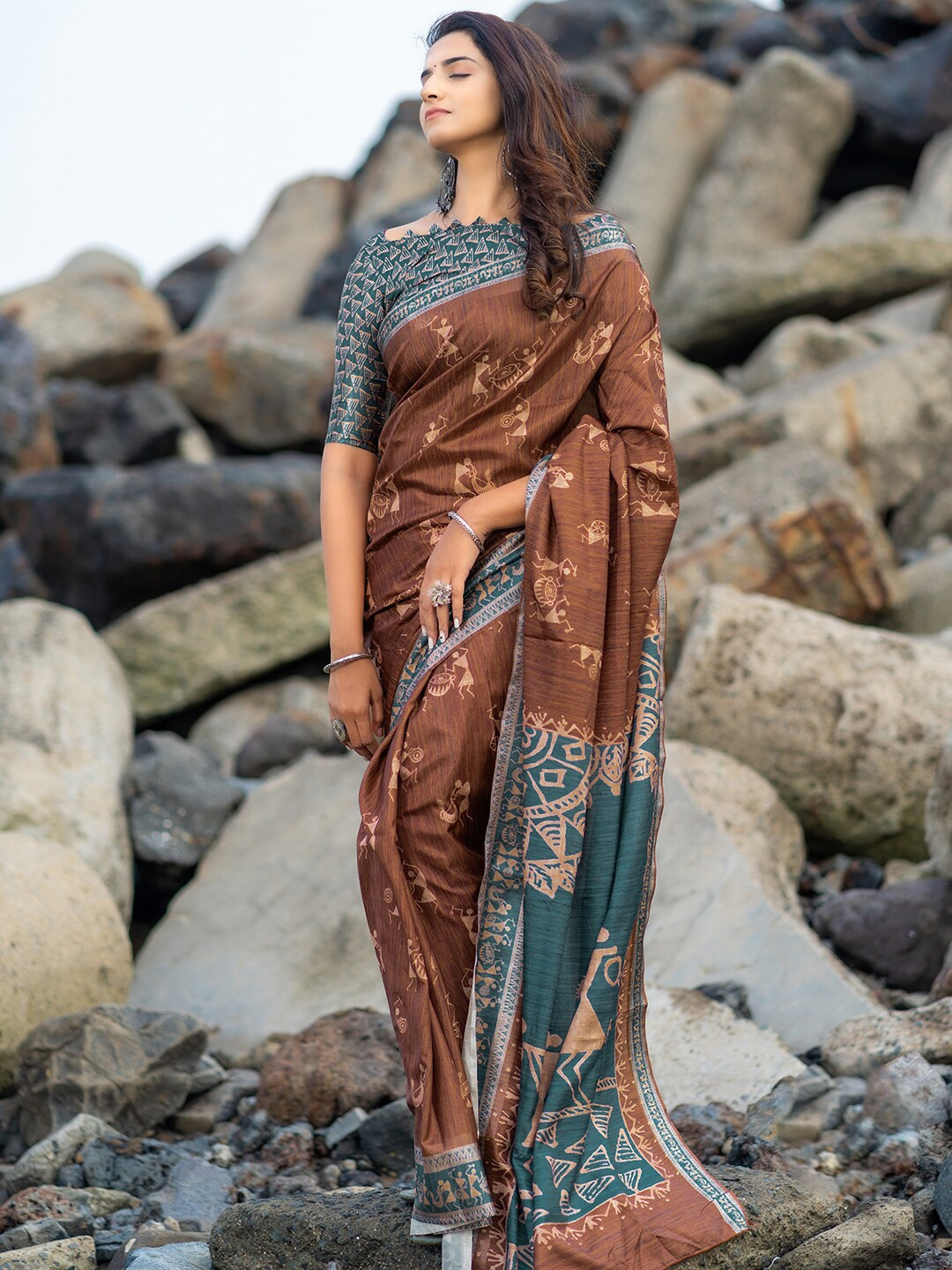 

Mitera Brown & Blue Warli Printed Dola Silk Saree