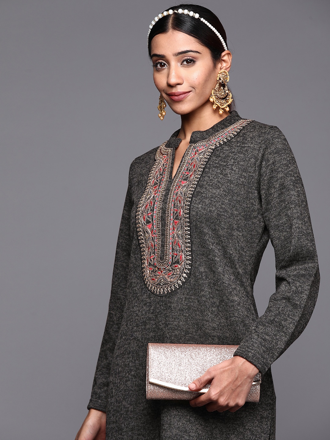 

Libas Women Charcoal Grey Embellished Yoke Design Wool Straight Kurta
