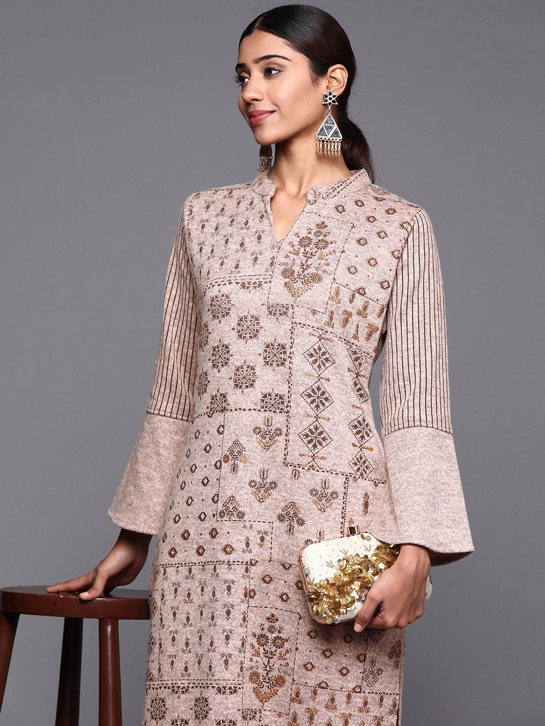 

Libas Women Taupe Self Design Winter Kurta