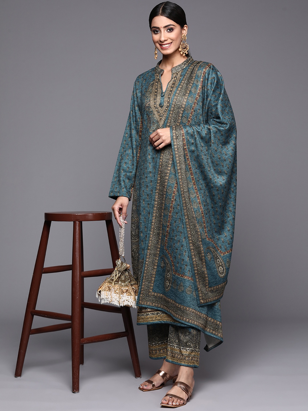 

Libas Women Teal Blue Printed Beads and Stones Wool Kurta with Trousers & Dupatta