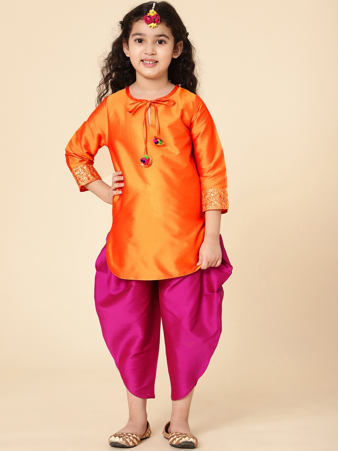 

A T U N Girls Orange Kurta with Dhoti Pants