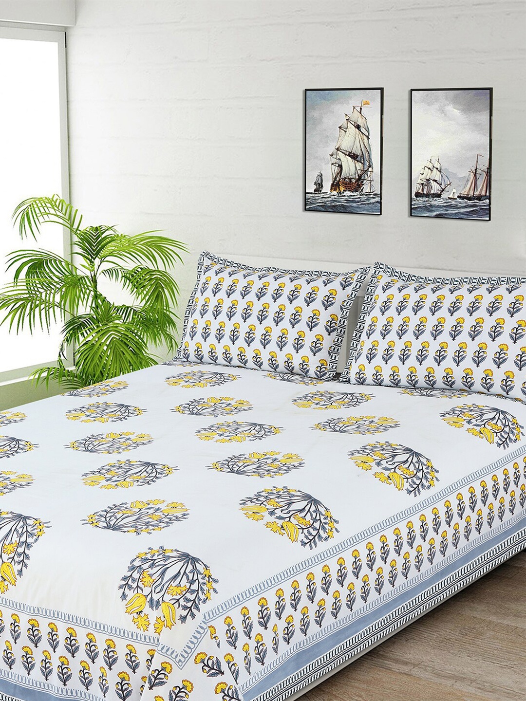 

Salona Bichona White & Yellow Floral 144 TC Queen Bedsheet with 2 Pillow Covers