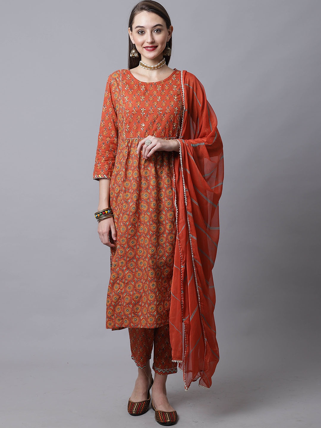 

Rajnandini Women Brown Floral Printed Pure Cotton Kurta with Trousers & With Dupatta