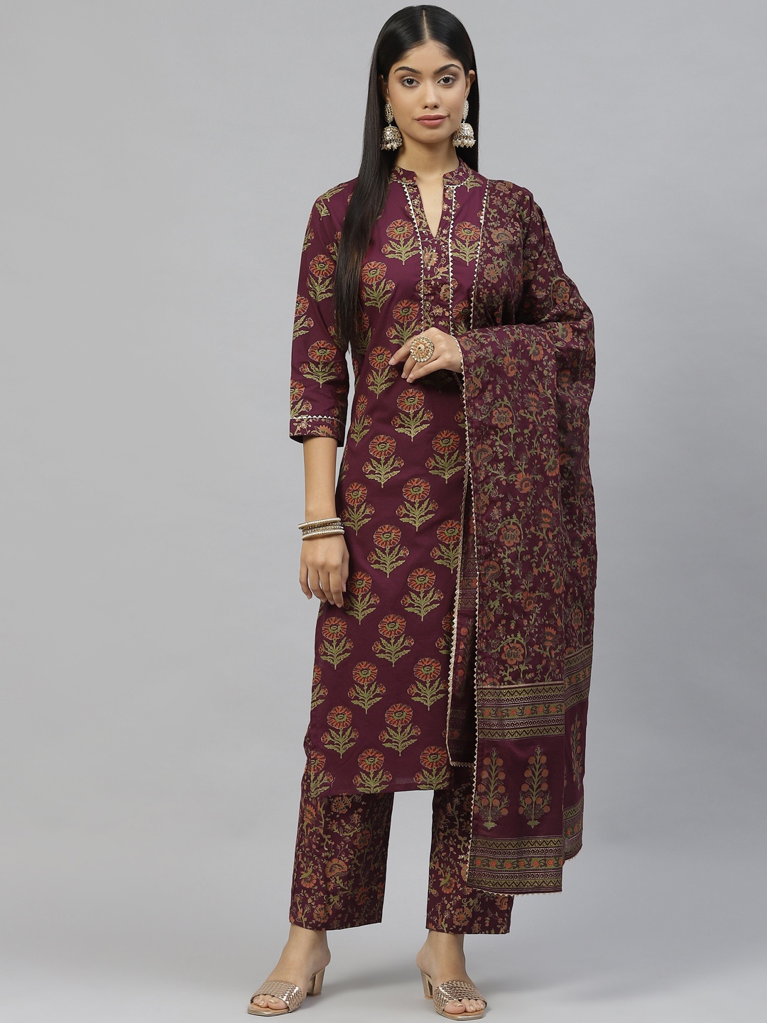 

Divena Women Purple & Green Floral Printed Cotton Kurta with Trousers & Dupatta