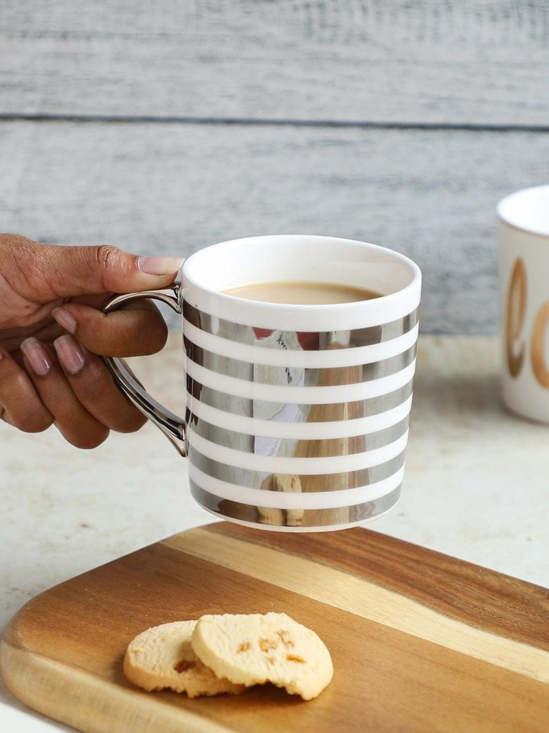 

Nestasia White & Silver Printed Ceramic Glossy Mug