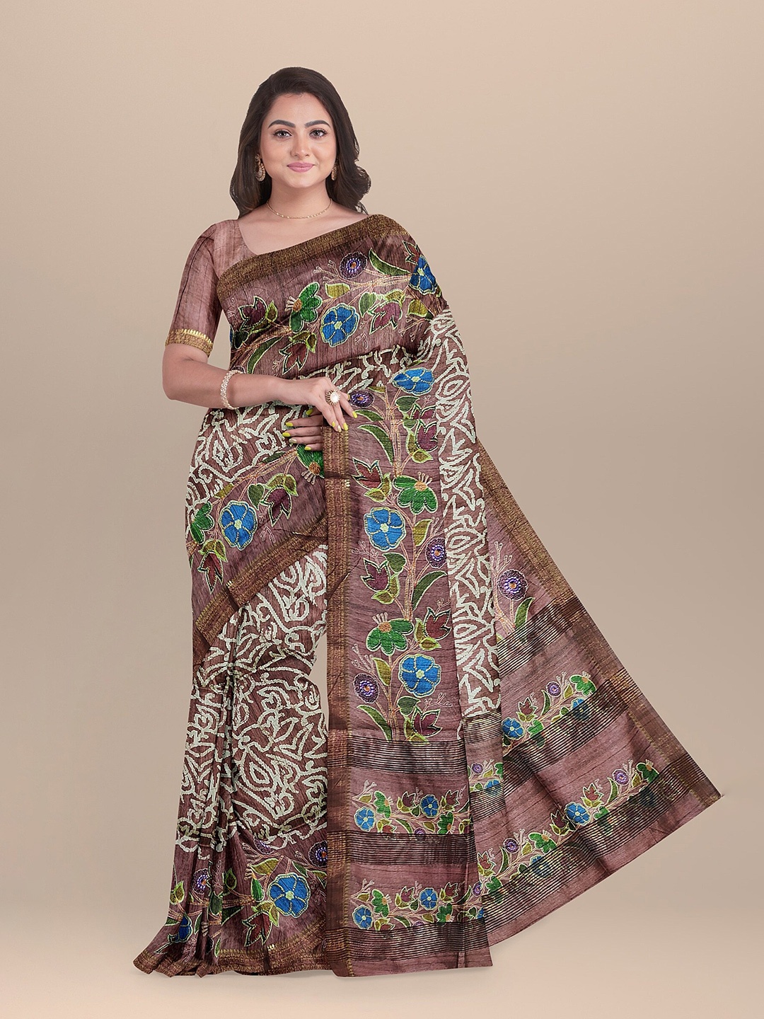 

The Chennai Silks Brown & Blue Floral Zari Jute Cotton Saree