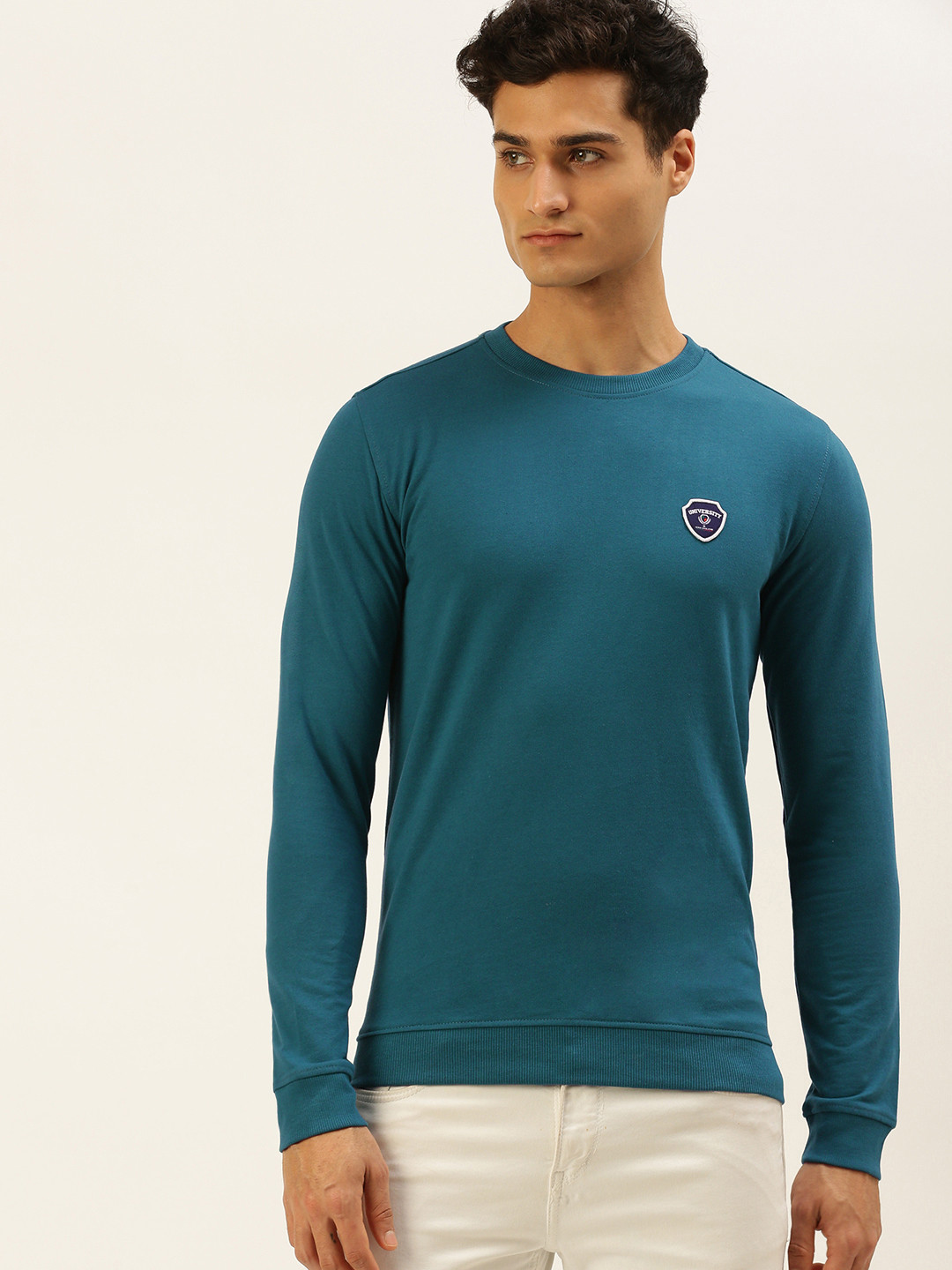 

PETER ENGLAND UNIVERSITY Men Teal Blue Solid Brand Logo Applique Slim Fit Sweatshirt