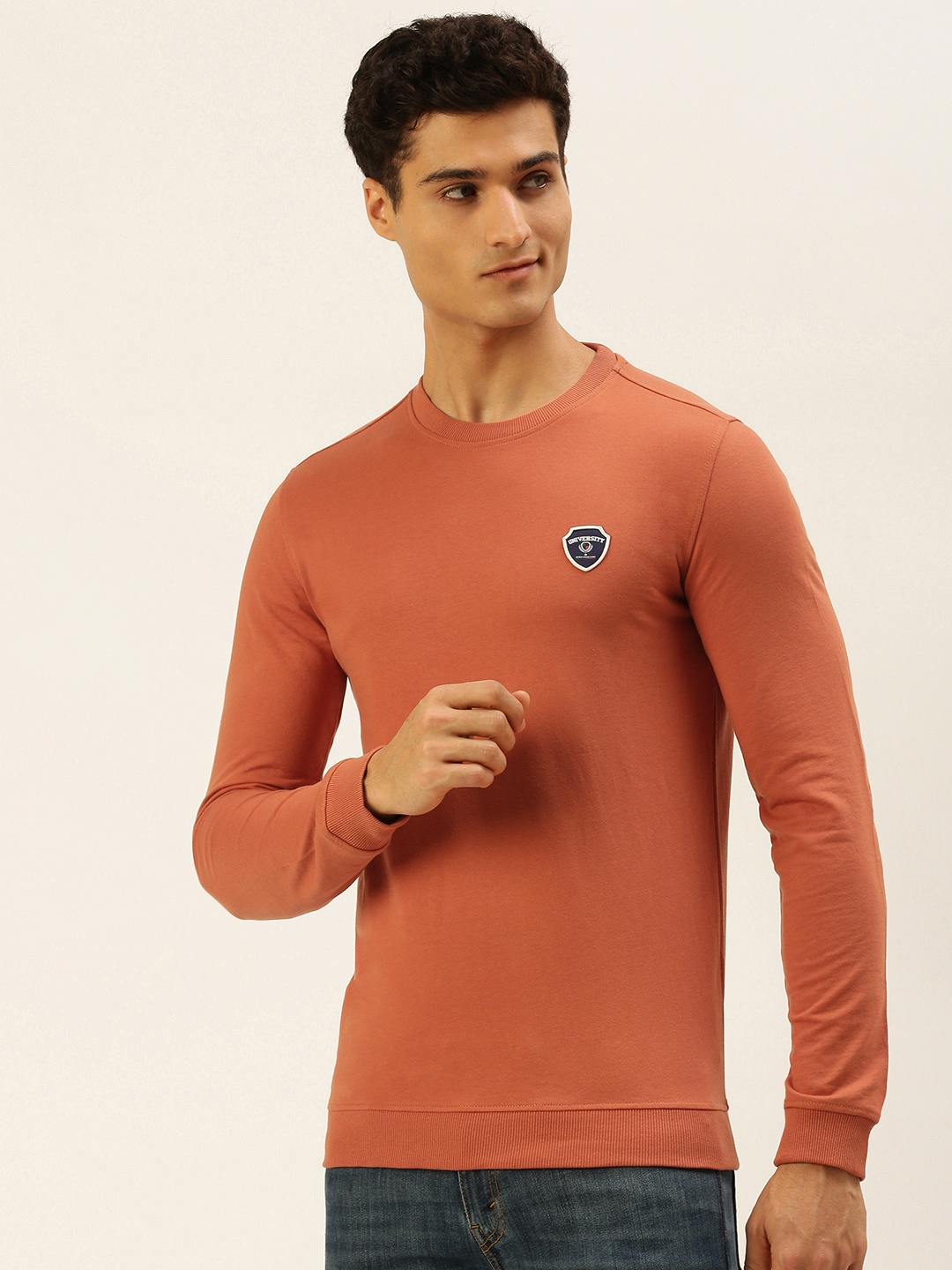

PETER ENGLAND UNIVERSITY Men Brick Red Solid Brand Logo Applique Slim Fit Sweatshirt