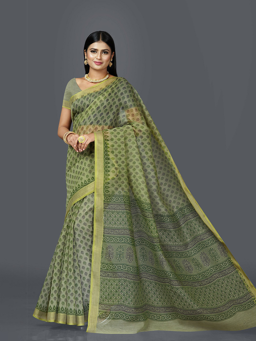 

SHANVIKA Green Ethnic Motifs Block Print Saree