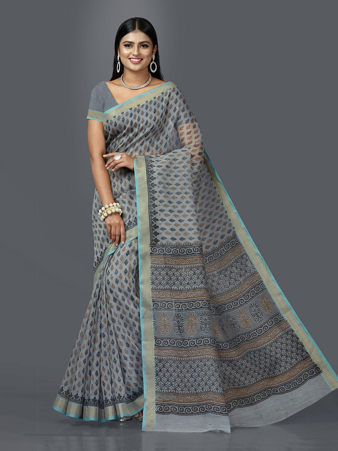 

SHANVIKA Blue & Gold-Toned Ethnic Motifs Block Print Saree