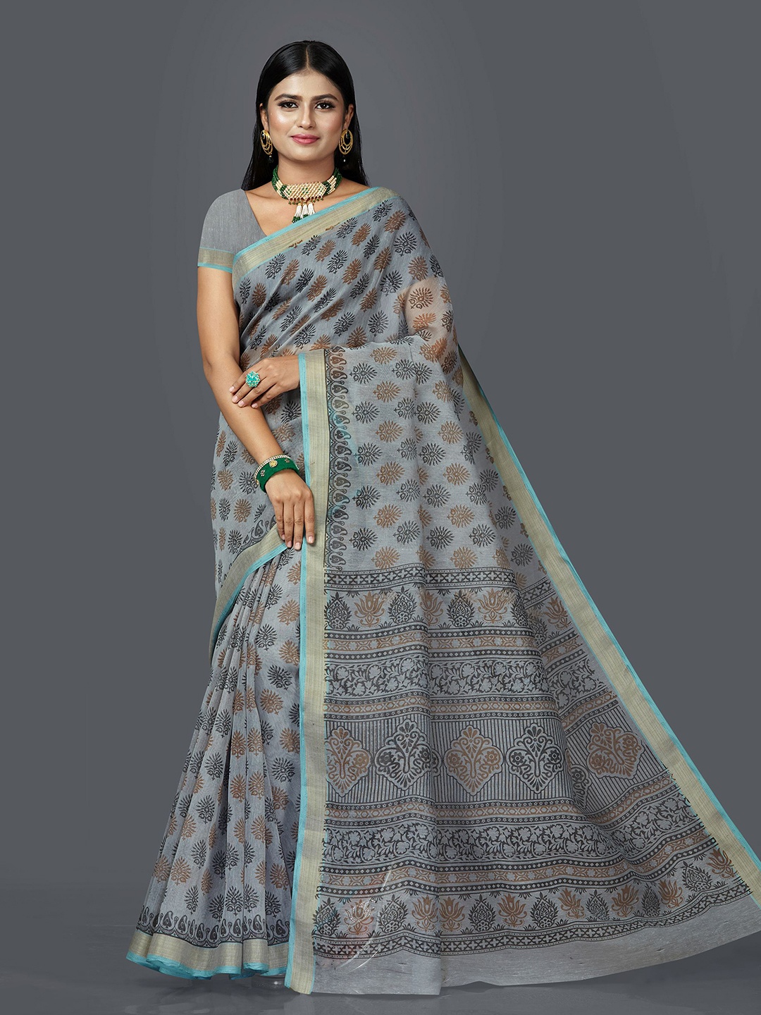 

SHANVIKA Blue & Brown Ethnic Motifs Cotton Zari Gadwal Saree