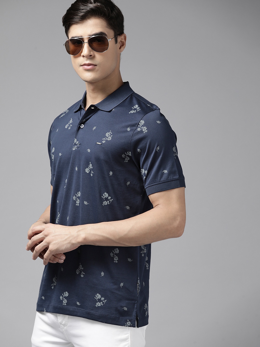 

Van Heusen Men Navy Blue Floral Printed Pure Cotton Slim Fit Polo T-shirt