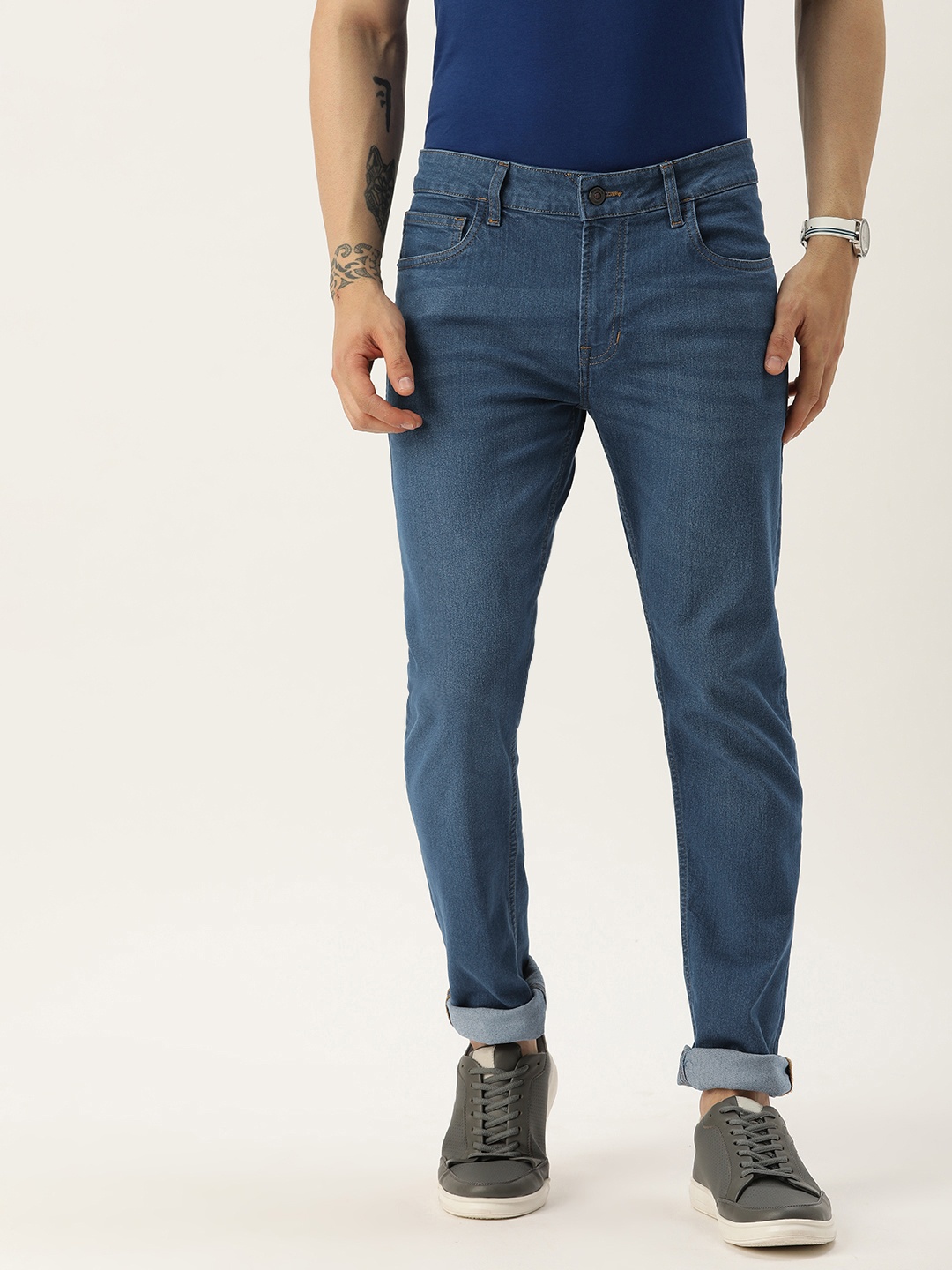 

Peter England Casuals Men Slim Fit Light Fade Stretchable Jeans, Blue