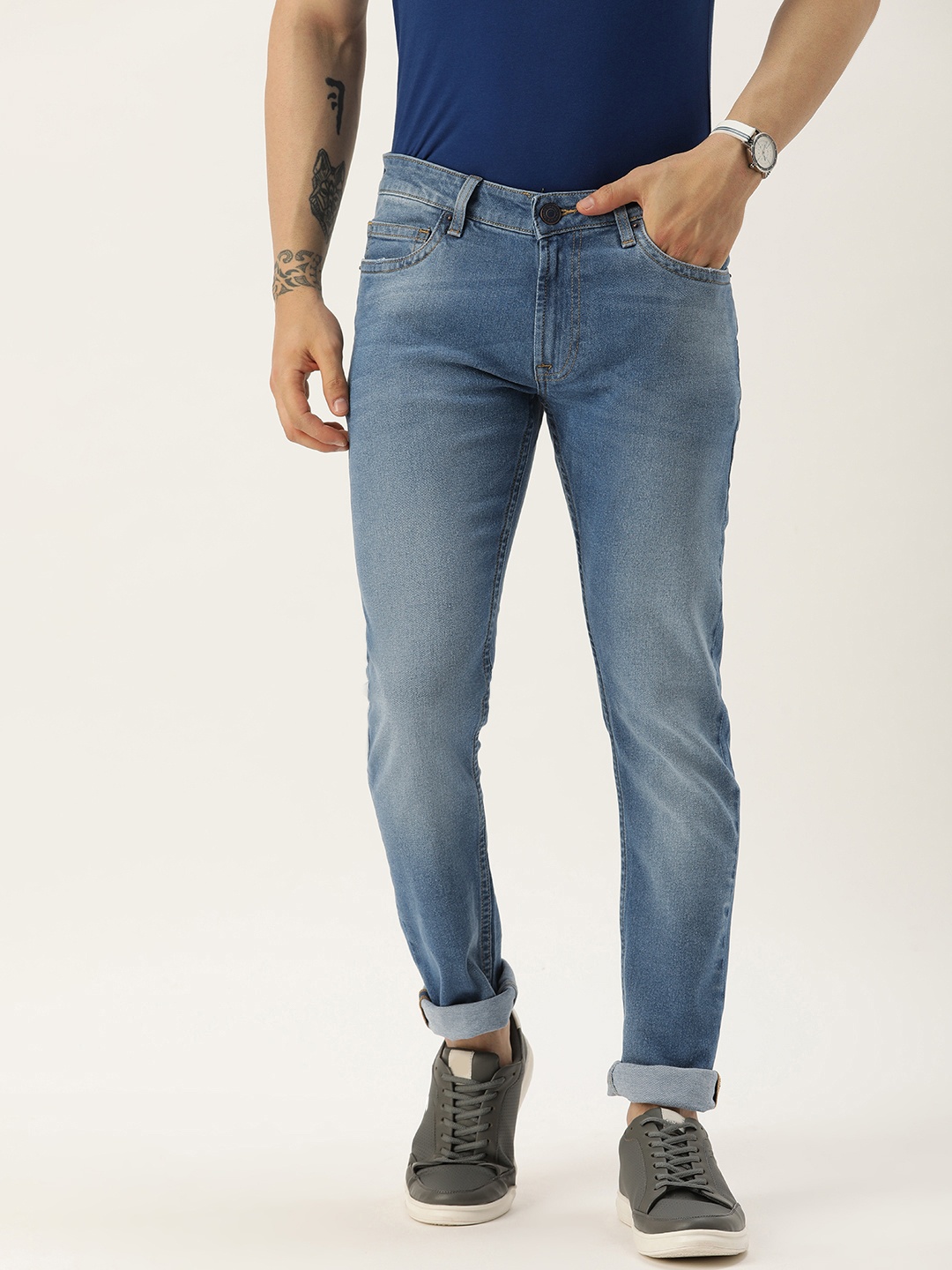 

Peter England Casuals Men Slim Fit Heavy Fade Stretchable Jeans, Blue