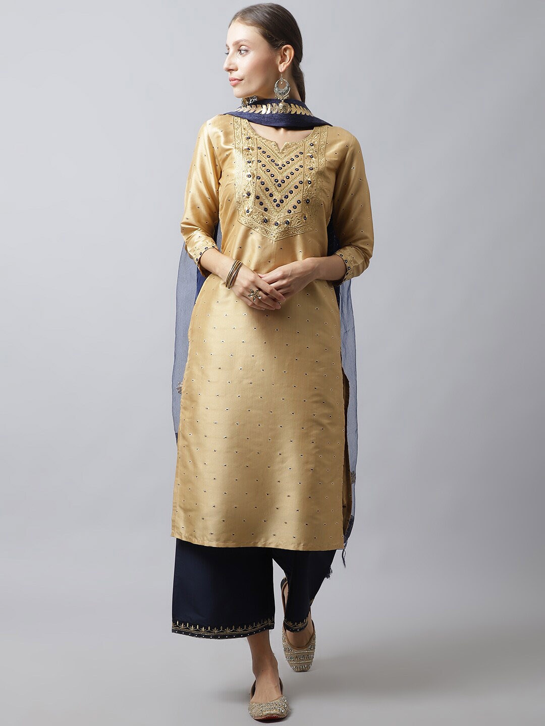 

Tulsattva Women Beige Embroidered Mirror Work Dupion Silk Kurta With Palazzo And Dupatta