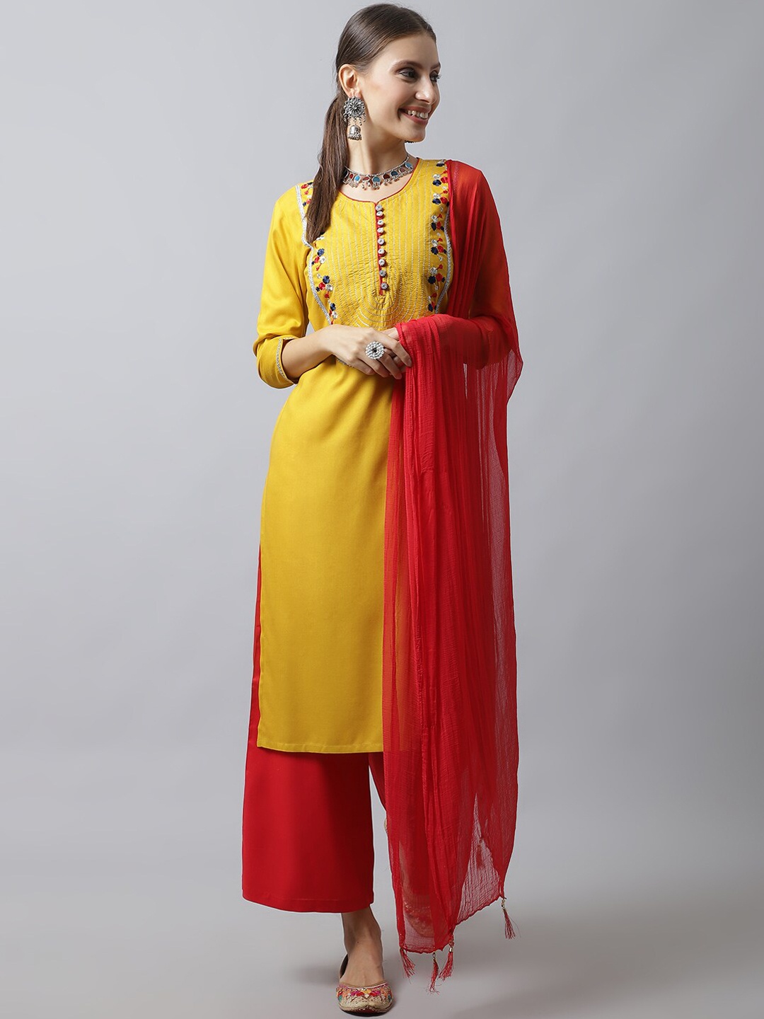 

Tulsattva Women Mustard Yellow Floral Embroidered Kurta with Trousers And Dupatta