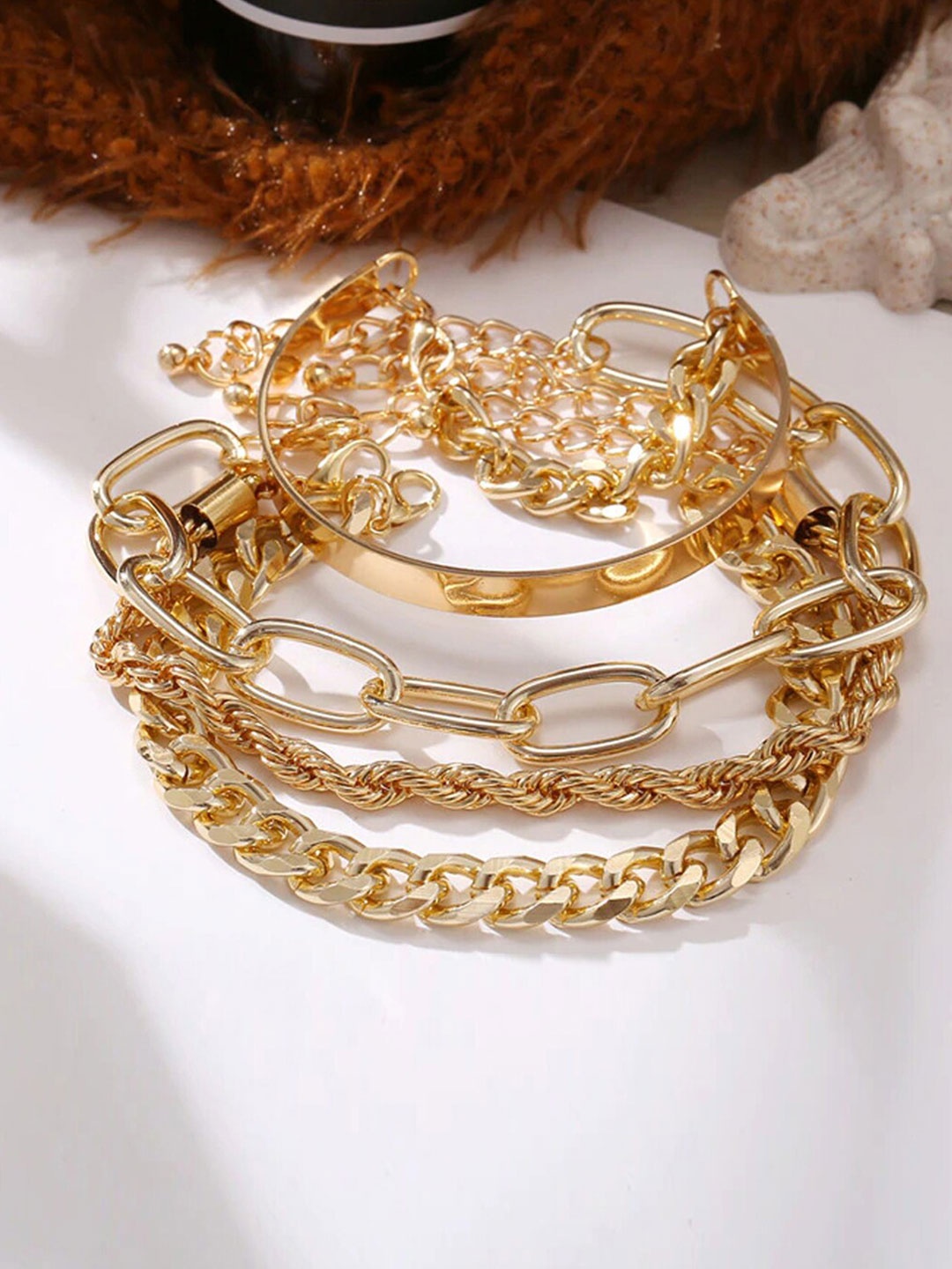 

Jewels Galaxy Women Set of 4 Gold-Plated Wraparound Bracelet