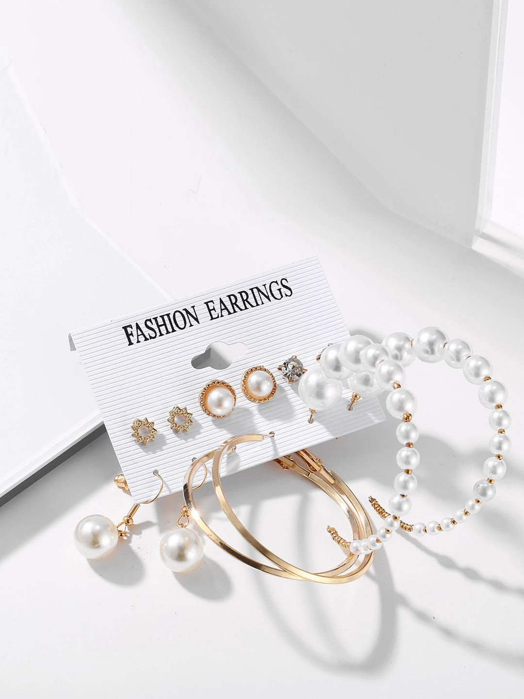 

Jewels Galaxy Women White & Gold-Toned Contemporary Studs Earrings
