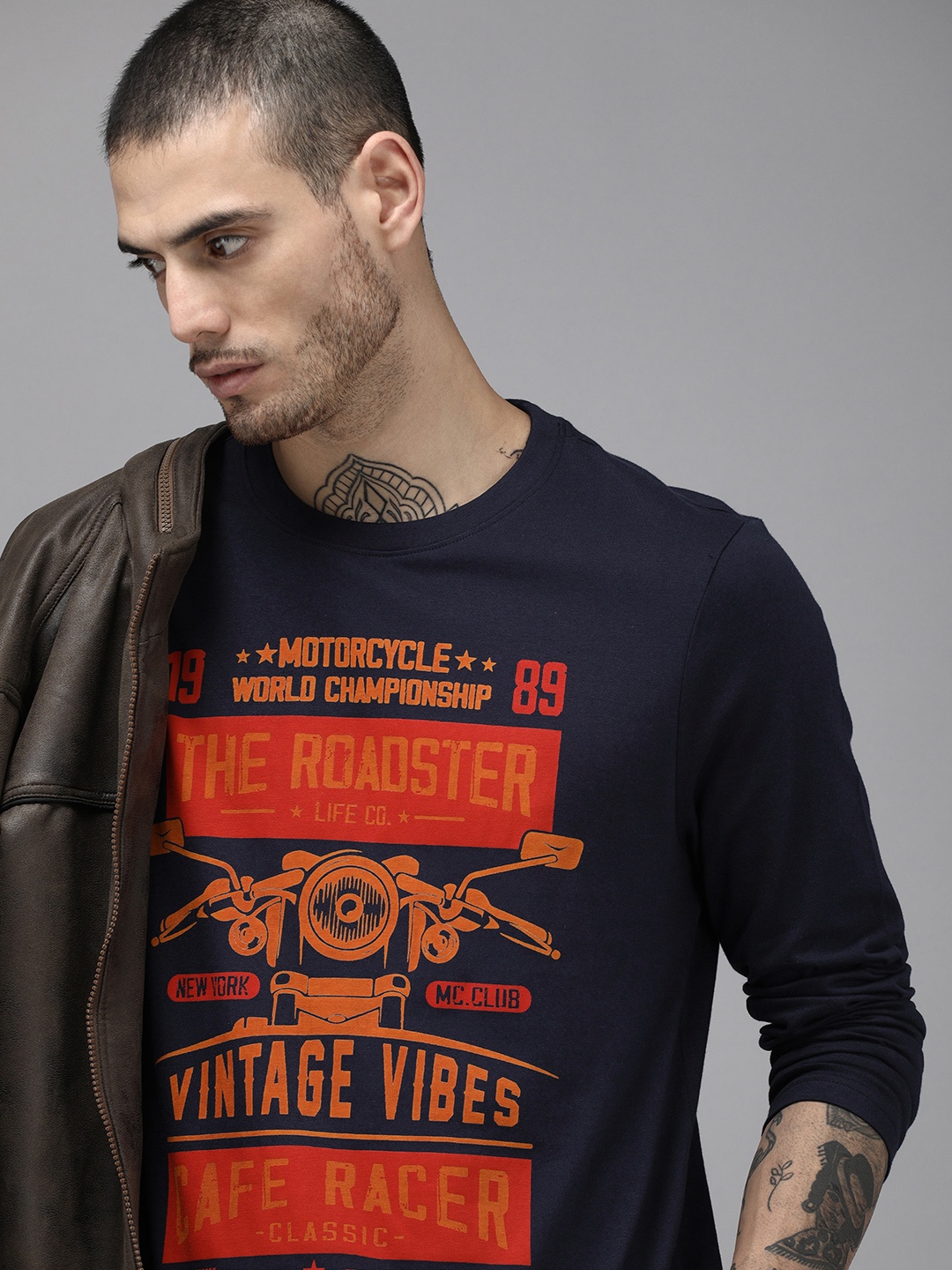 

Roadster Men Navy Blue & Orange Printed Pure Cotton T-shirt