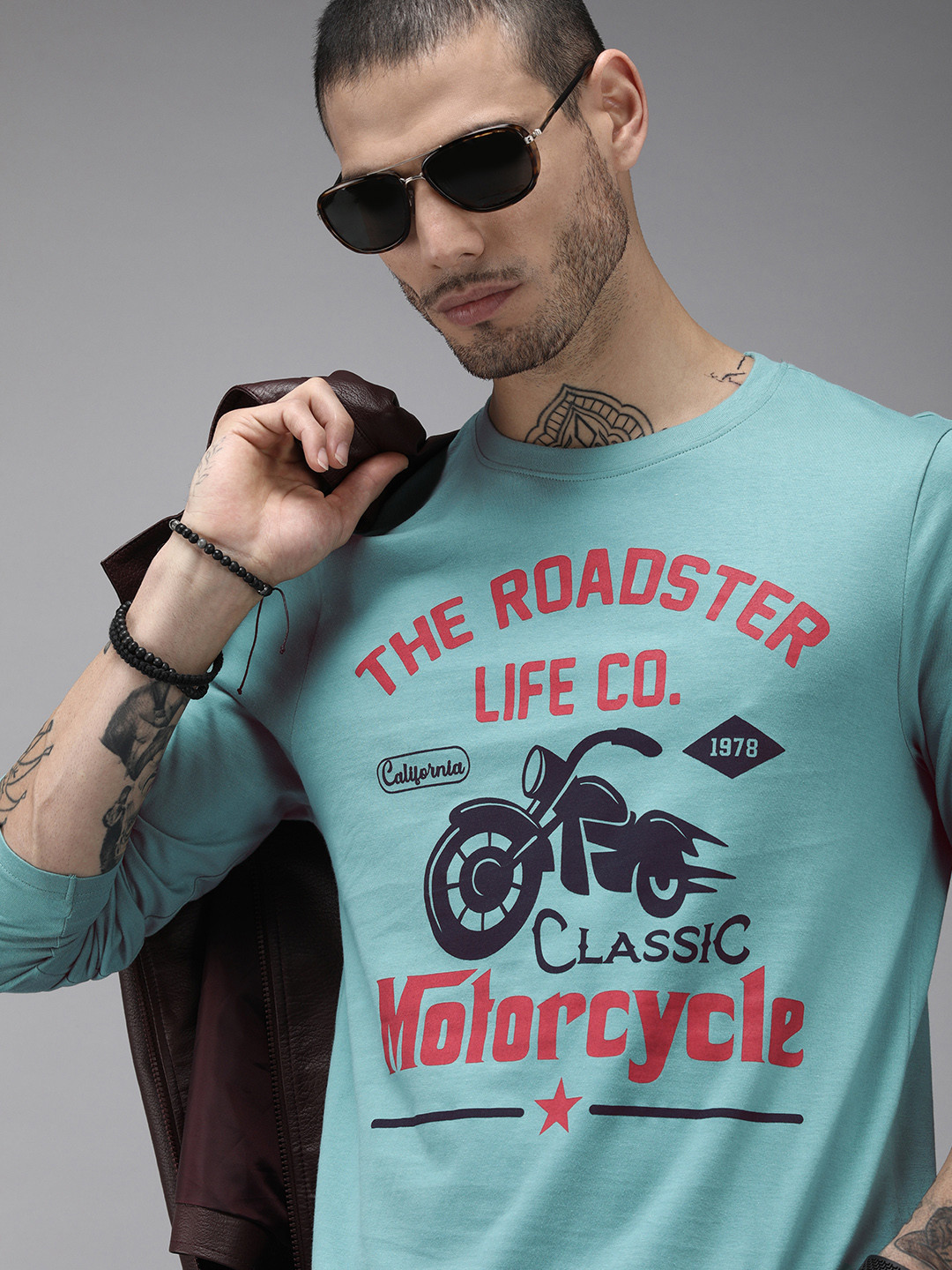

Roadster Men Turquoise Blue Typography Printed Pure Cotton T-shirt