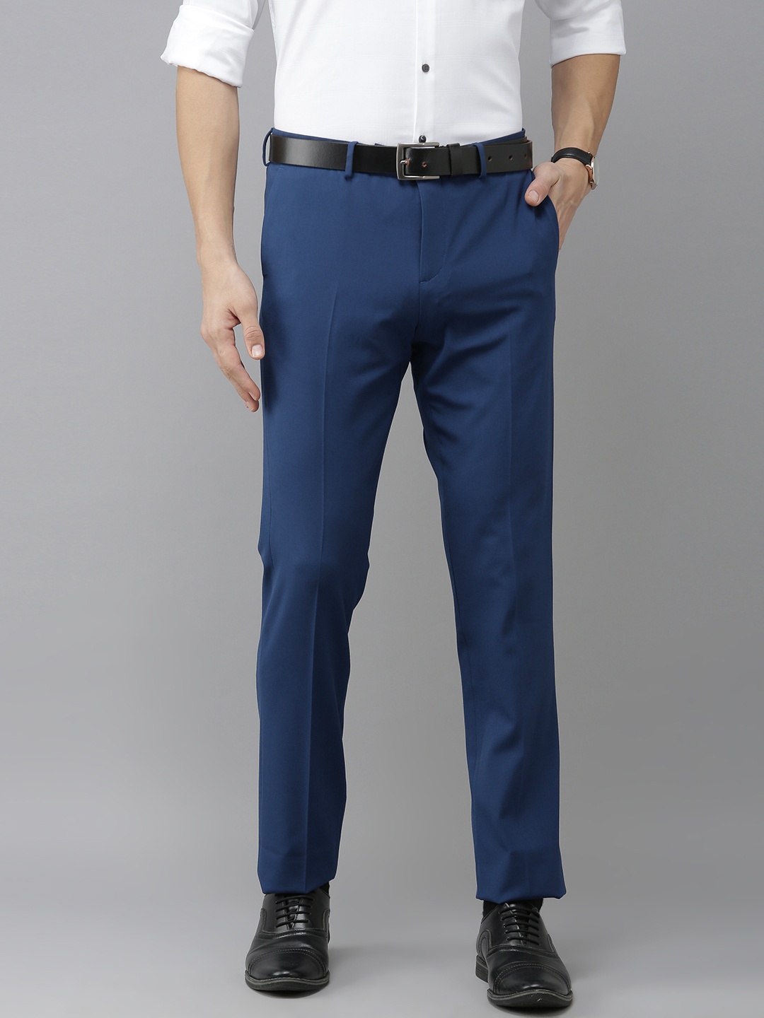 

Arrow Men Blue Solid Tailored Fit Pleated Smart Flex Formal Trousers