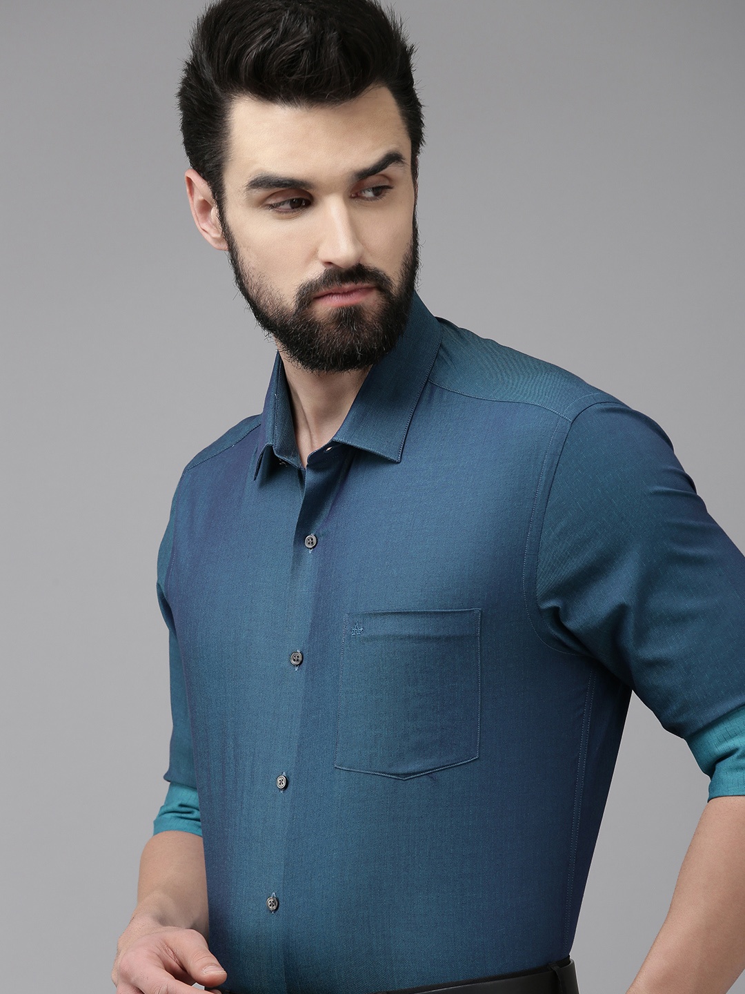 

Arrow Men Teal Blue Original Slim Fit Pure Cotton Formal Shirt