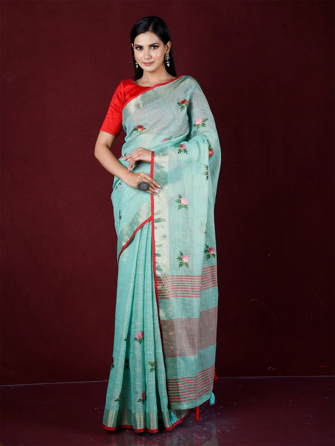 

Exclusiva Green & Red Floral Embroidered Pure Linen Saree