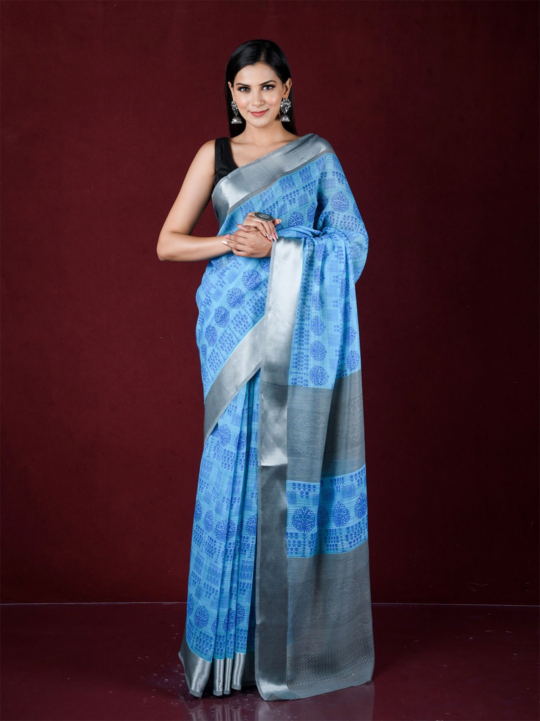 

Exclusiva Blue & Silver-Toned Floral Zari Pure Cotton Saree