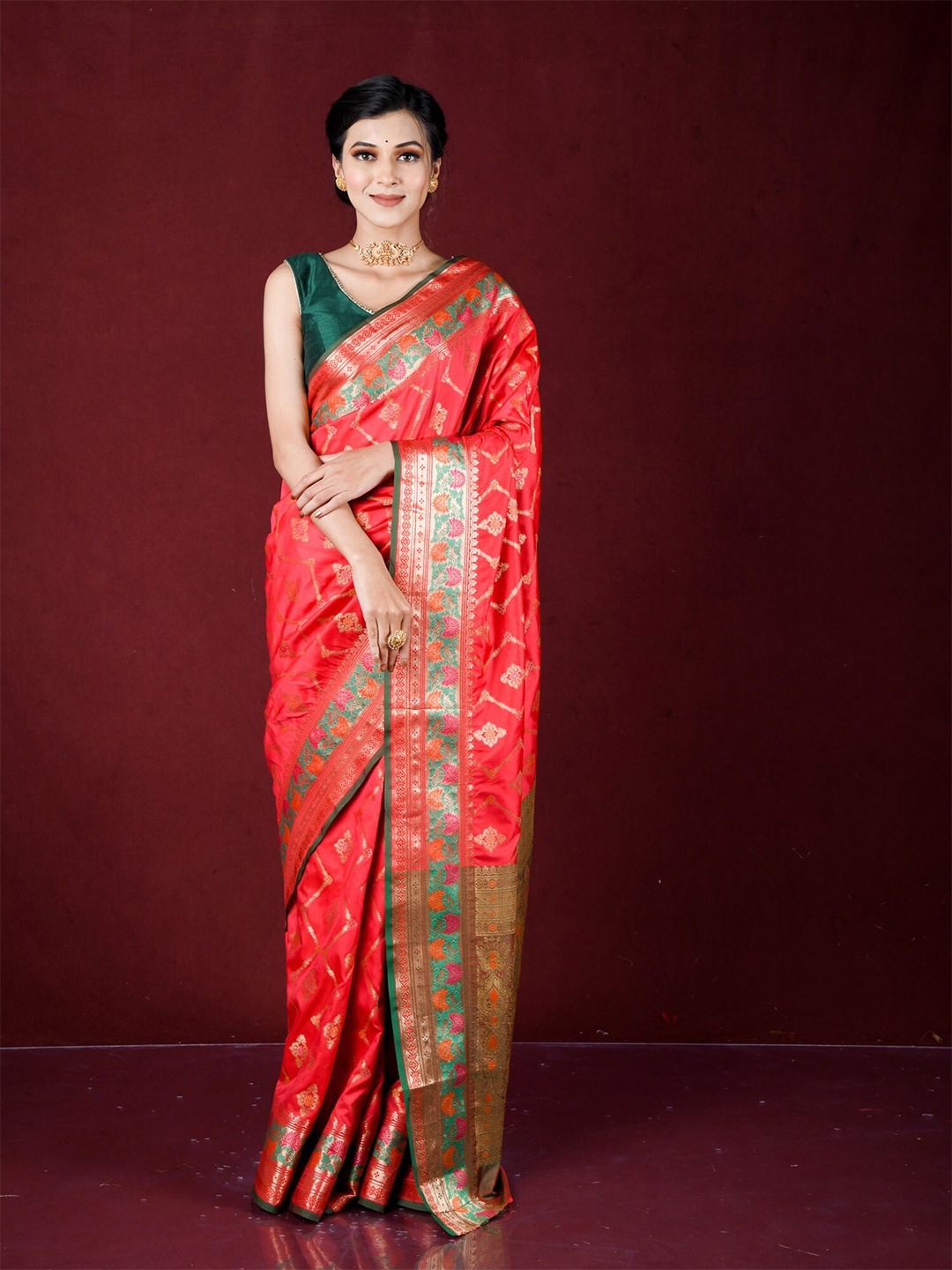 

Exclusiva Magenta & Green Ethnic Motifs Zari Silk Blend Banarasi Saree