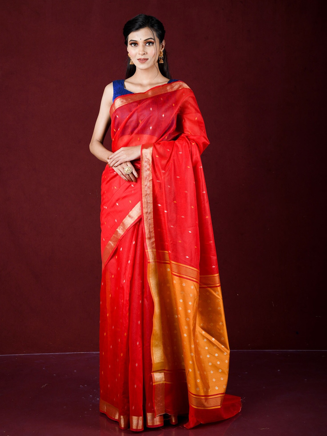 

Exclusiva Orange & Gold-Toned Ethnic Motifs Zari Banarasi Saree
