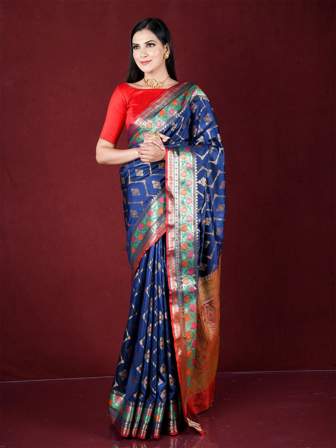 

Exclusiva Navy Blue & Red Woven Design Zari Silk Blend Banarasi Saree