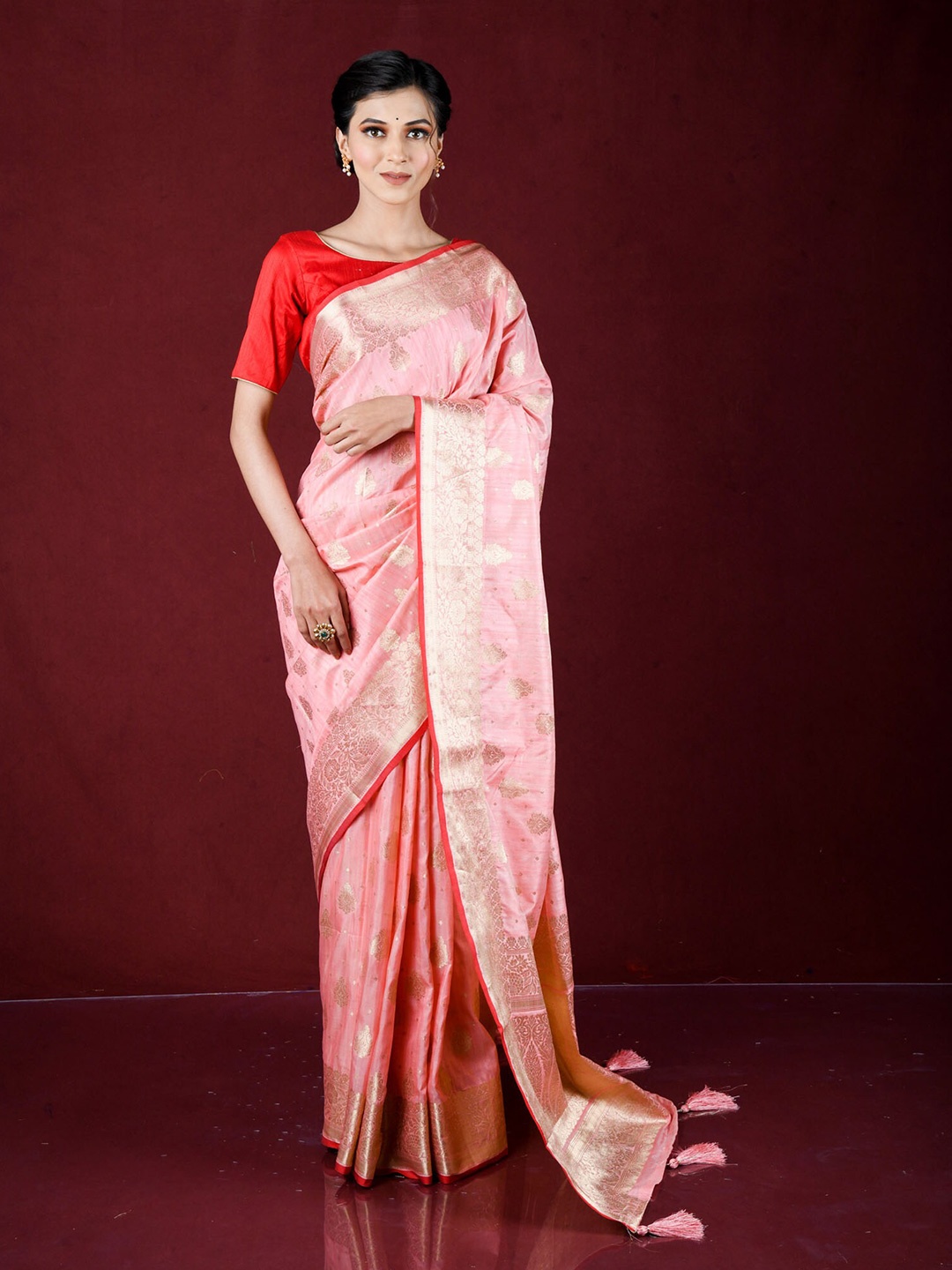 

Exclusiva Pink & Gold-Toned Ethnic Motifs Zari Silk Blend Banarasi Saree