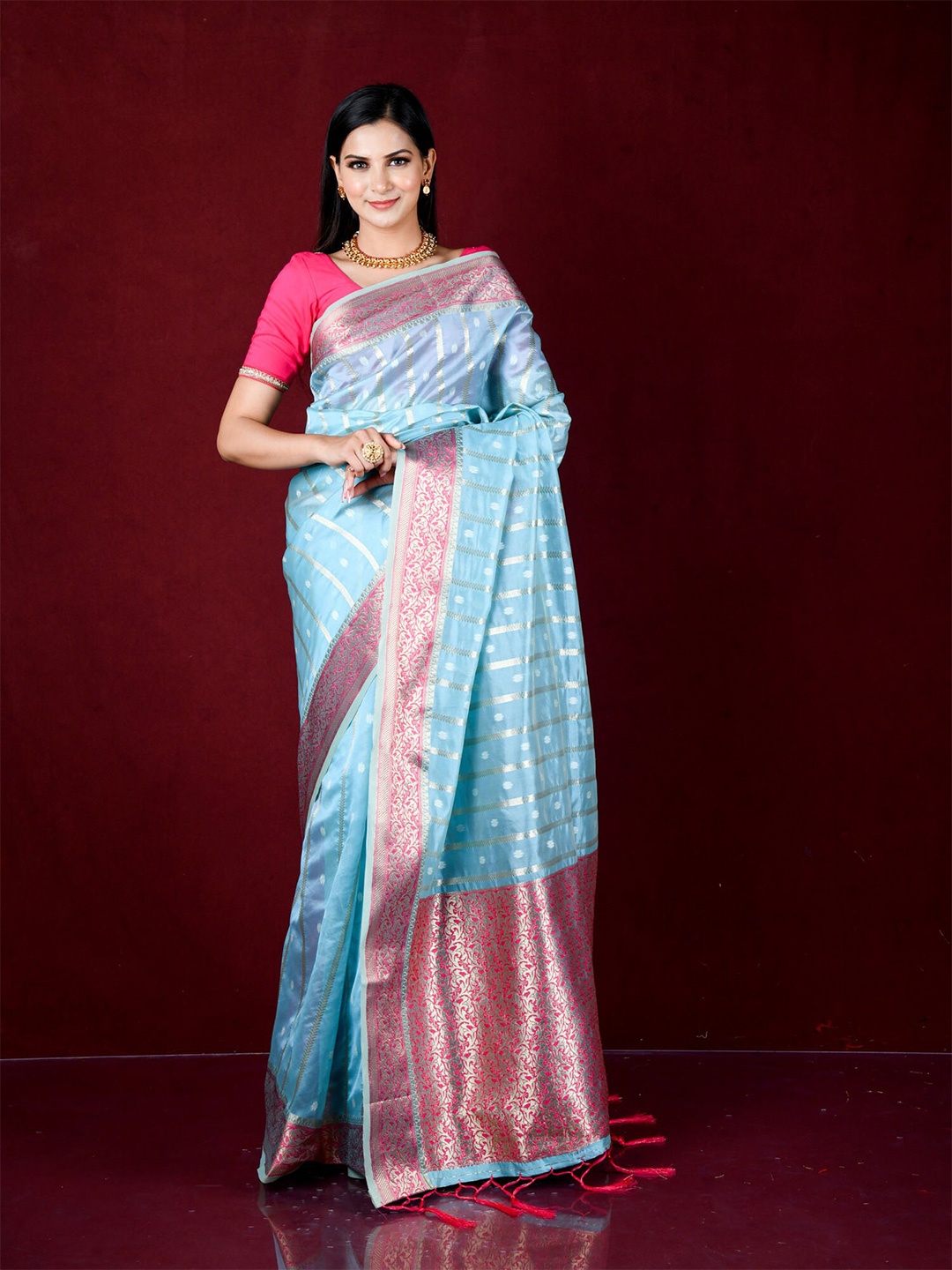 

Exclusiva Blue & Pink Ethnic Motifs Zari Organza Banarasi Saree