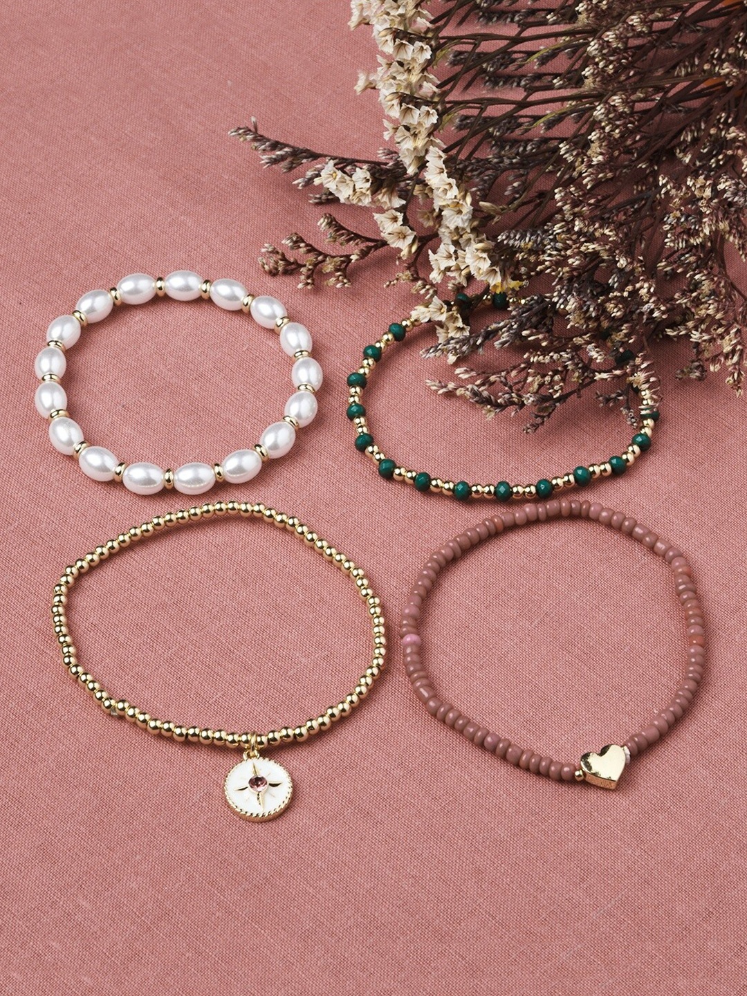 

Accessorize Women Set of 4 Gold-Toned & White Charms Stretch Bracelets