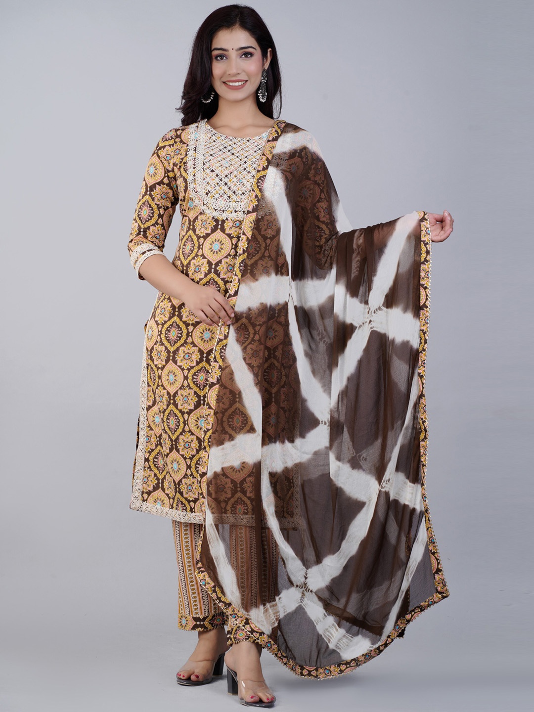 

NITVAN Women Brown Floral Printed Pure Cotton Kurta with Trousers & With Dupatta