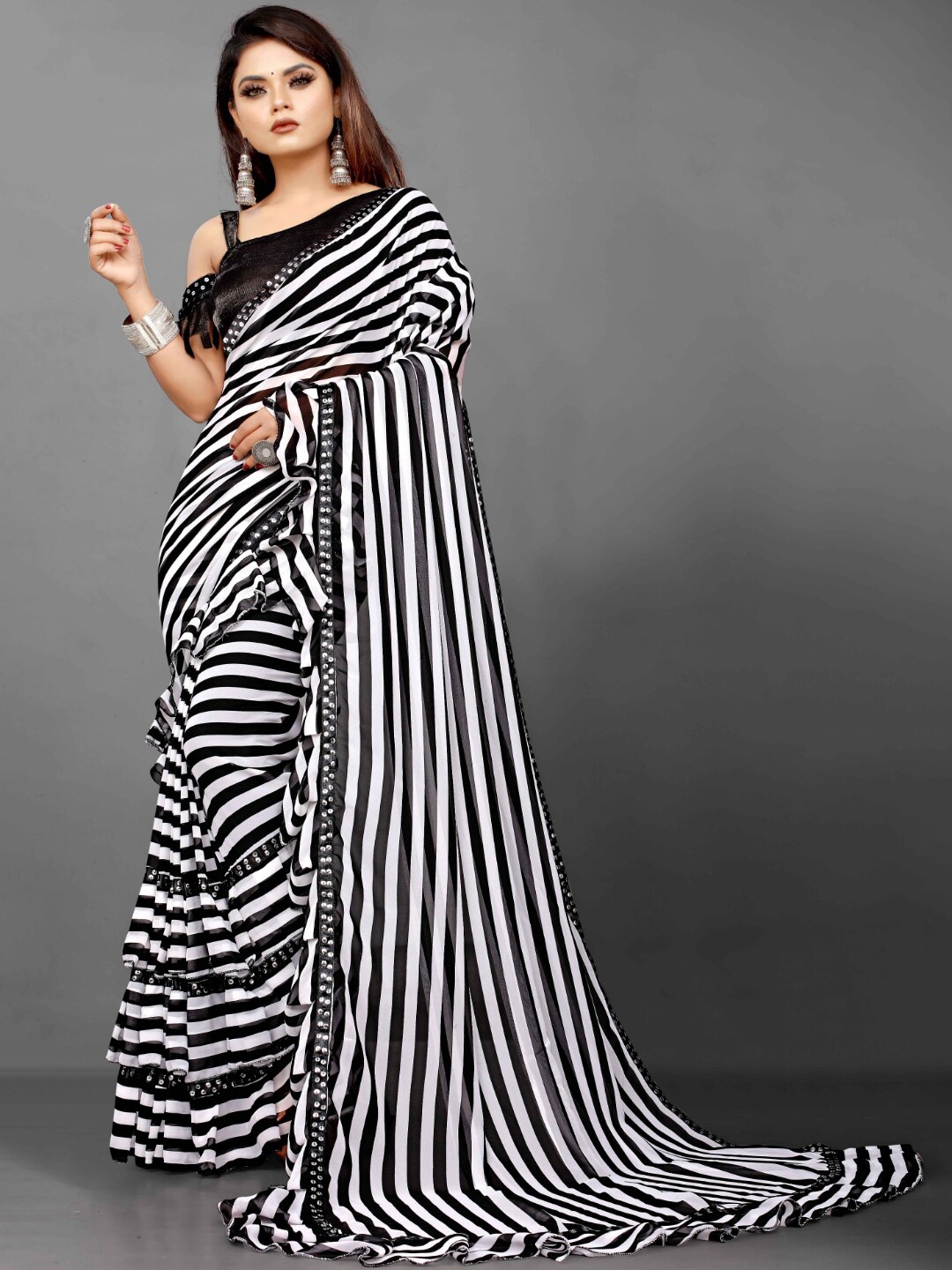 

B4ME COM White & Black Striped Sequinned Pure Georgette Saree