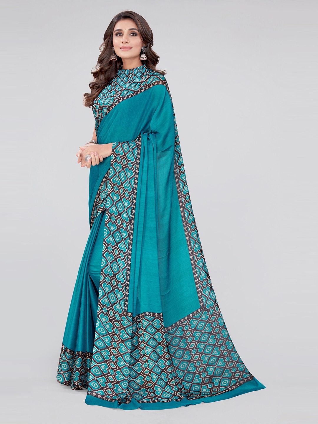 

MIRCHI FASHION Turquoise Blue & Brown Ikat Saree